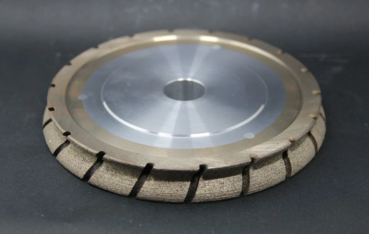 grinding wheel 18